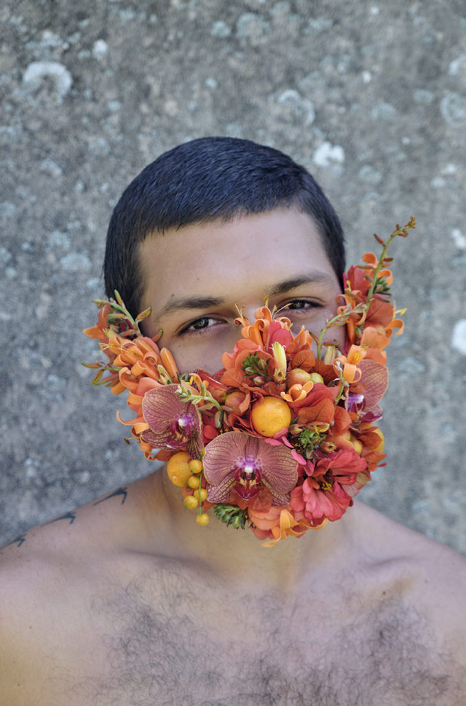 Noah Harders wearing one of his floral masks.